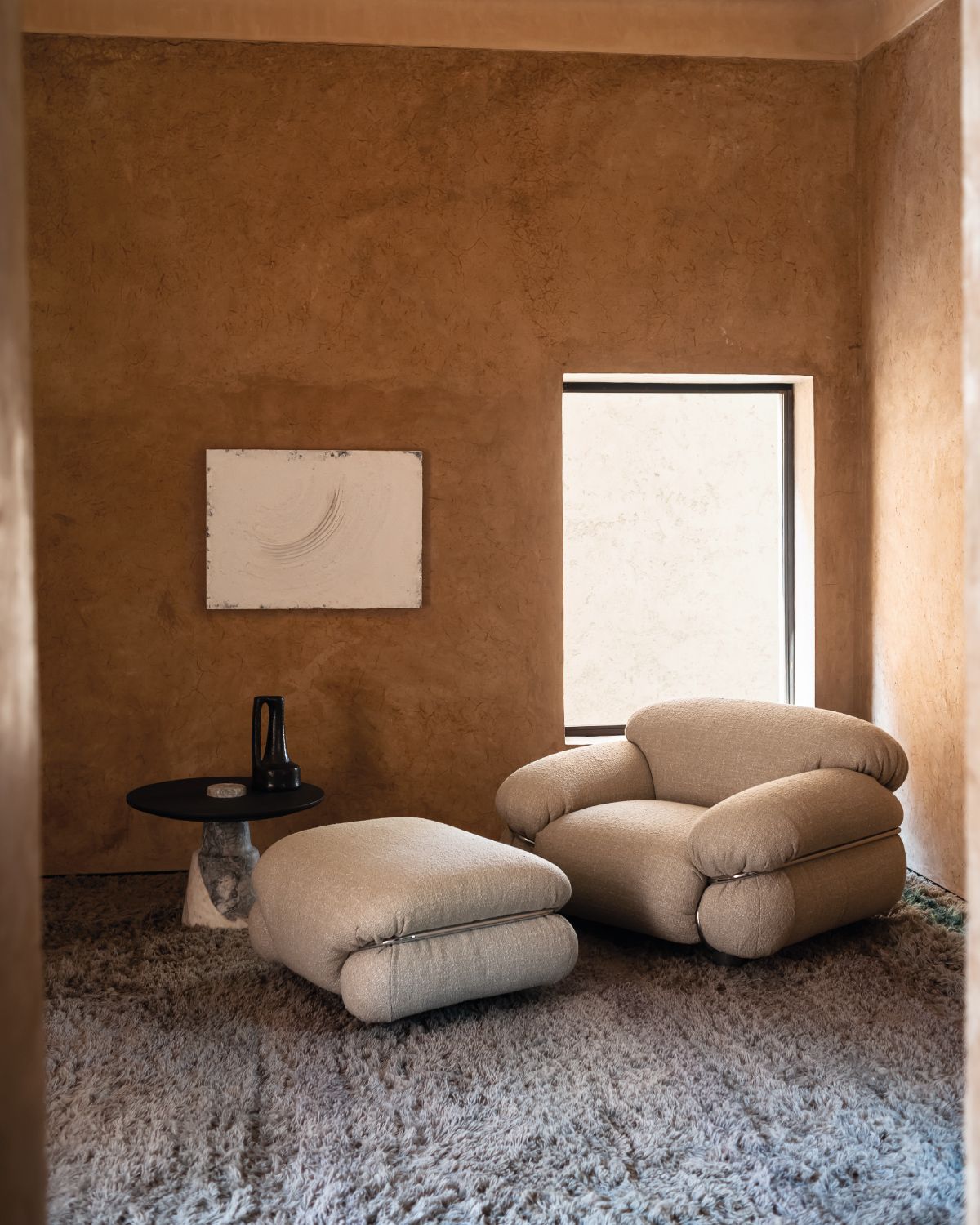 An seating area with panache, the iconic Sesann Armchair.